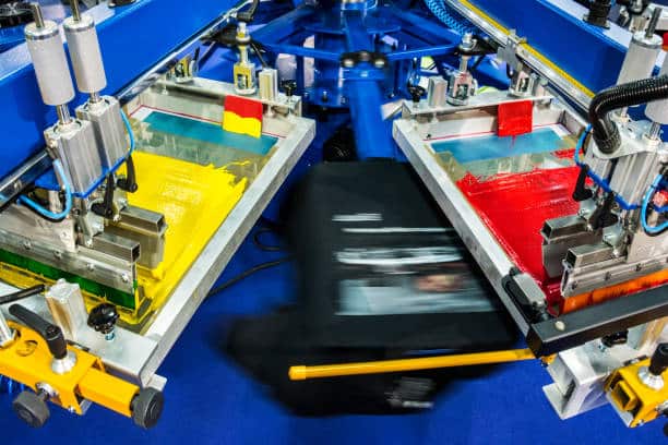 automated silk screen printing rotary machine prints black t shitrs